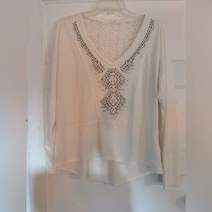Long sleeved white embellished shirt